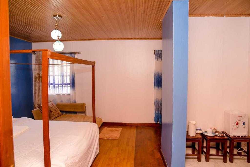 Postel nebo postele na pokoji v ubytování Hope Homestay