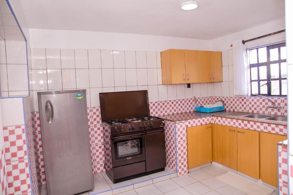 Kuchyň nebo kuchyňský kout v ubytování Hope Homestay
