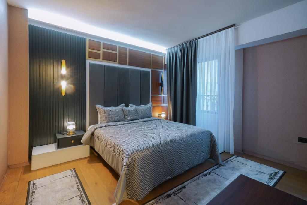Postel nebo postele na pokoji v ubytování Bushi Resort & SPA