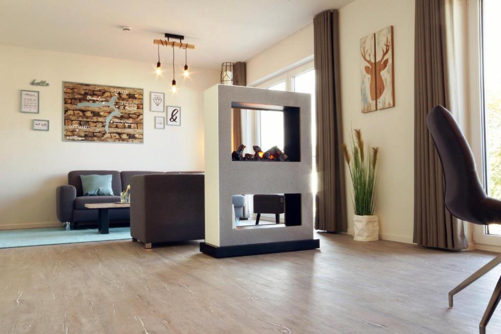 Posezení v ubytování FerienHAUS Marta am Diemelsee im Sauerland mit eigener Sauna, Garten, Terrasse, Balkon und Blick auf den See