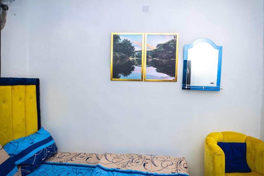 Posezení v ubytování Spectacular 3/4-Bed-Apt With 24hrs Power And FAST Wi-Fi