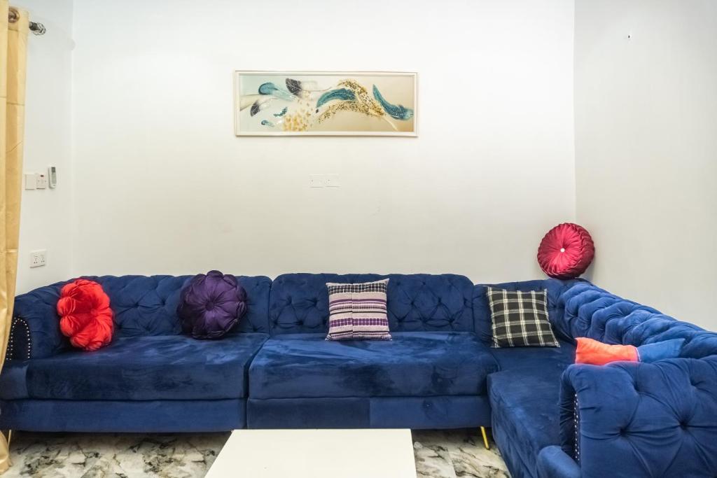 Posezení v ubytování Spectacular 3/4-Bed-Apt With 24hrs Power And FAST Wi-Fi