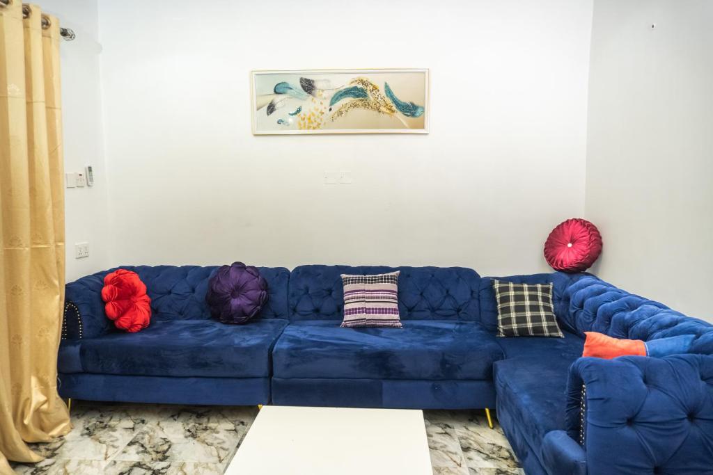 Posezení v ubytování Spectacular 3/4-Bed-Apt With 24hrs Power And FAST Wi-Fi
