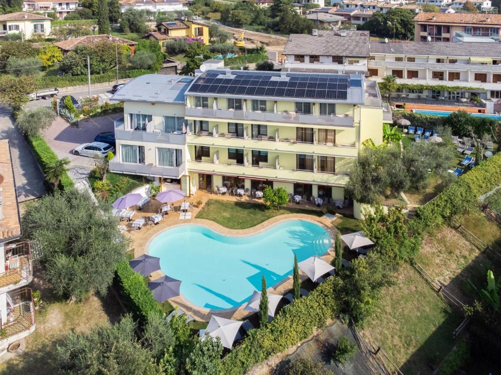 an aerial view of the hotel and the swimming pool at Hotel Alessandra in Garda