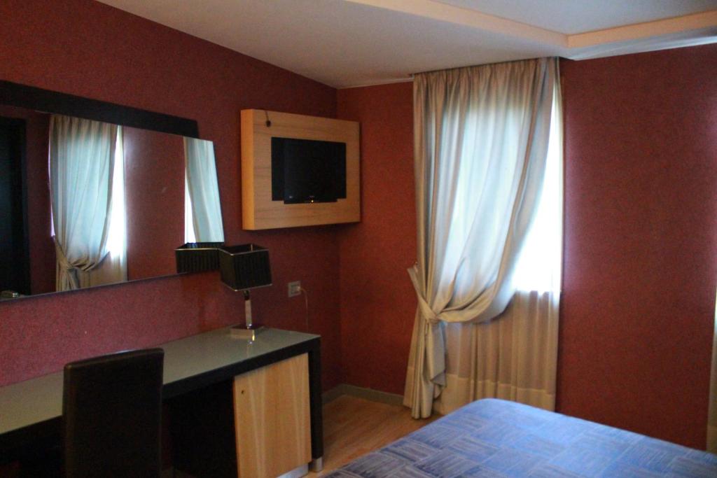 TV o dispositivi per l'intrattenimento presso Hotel Ginepro