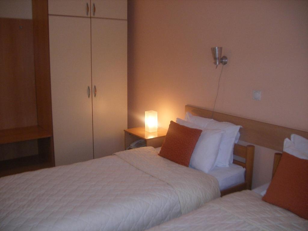 Postel nebo postele na pokoji v ubytování Hotel 7