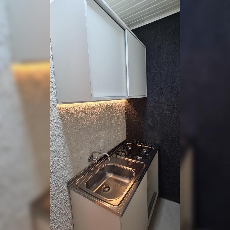 Kuchyň nebo kuchyňský kout v ubytování Hospedagem Almirante
