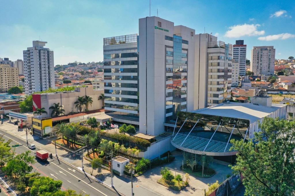 an overhead view of a city with a tall building at Wyndham Garden São Paulo Convention Nortel in São Paulo