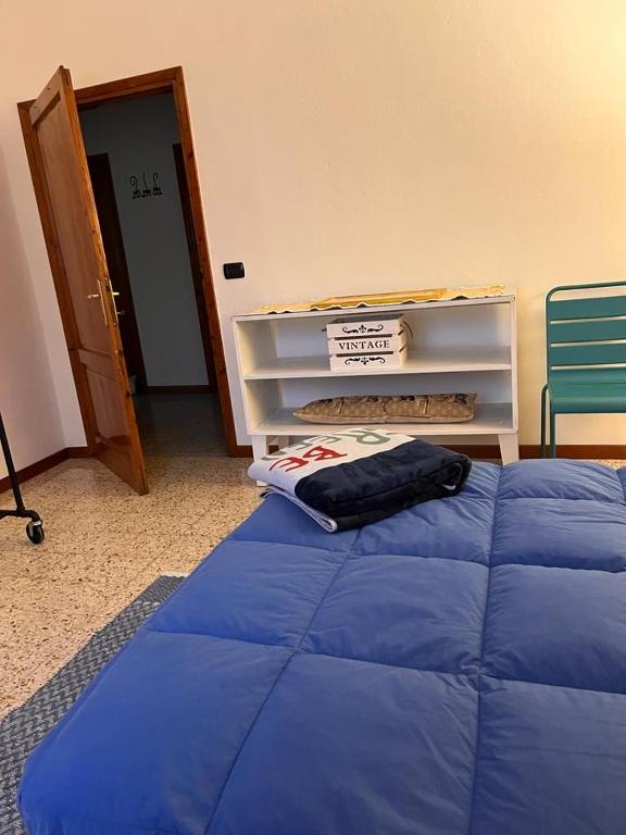 Łóżko lub łóżka w pokoju w obiekcie B&B Camelia