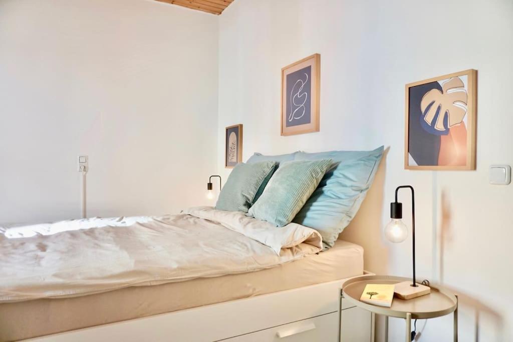 Postel nebo postele na pokoji v ubytování NEU I moderne zentrale Wohnung I Netflix I 4 Gäste