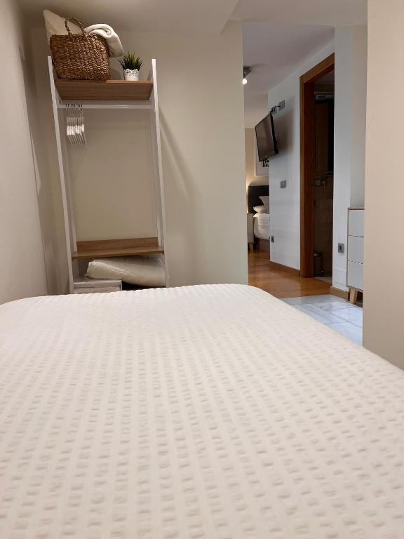 Postel nebo postele na pokoji v ubytování Loft Hygge Urbano Coruña con servicio de Parking