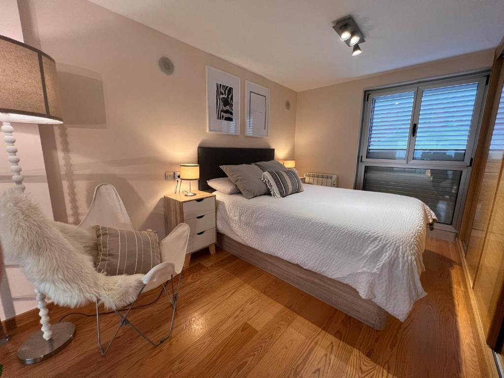Postel nebo postele na pokoji v ubytování Loft Hygge Urbano Coruña con servicio de Parking