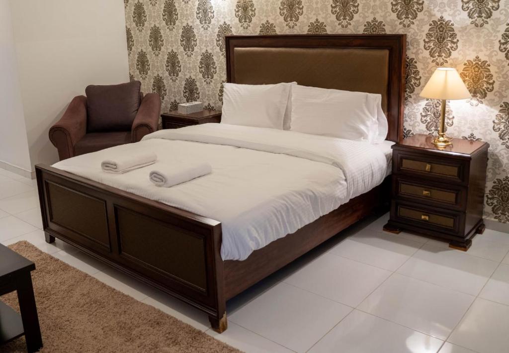 Postel nebo postele na pokoji v ubytování Aryaf hostel