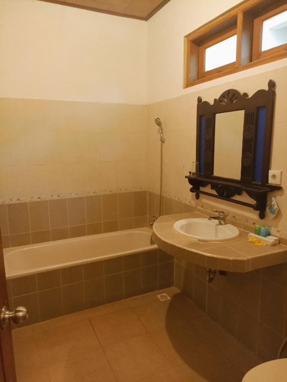 Koupelna v ubytování Kusnadi Hotel