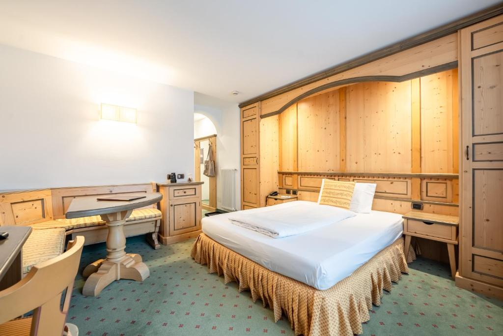 Łóżko lub łóżka w pokoju w obiekcie Croce Bianca Leisure & Spa Hotel
