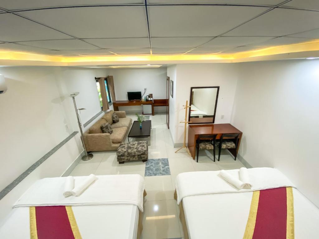 Khách sạn Vườn Cau & Khu vui chơi giải trí SaLa - Quarto Quádruplo Deluxe