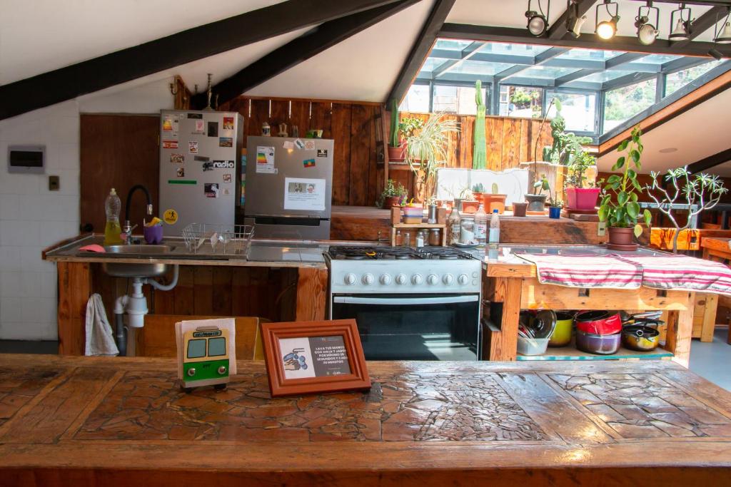 Kuchyň nebo kuchyňský kout v ubytování Hostal Po