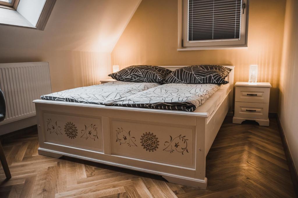 Posteľ alebo postele v izbe v ubytovaní Płazowianka
