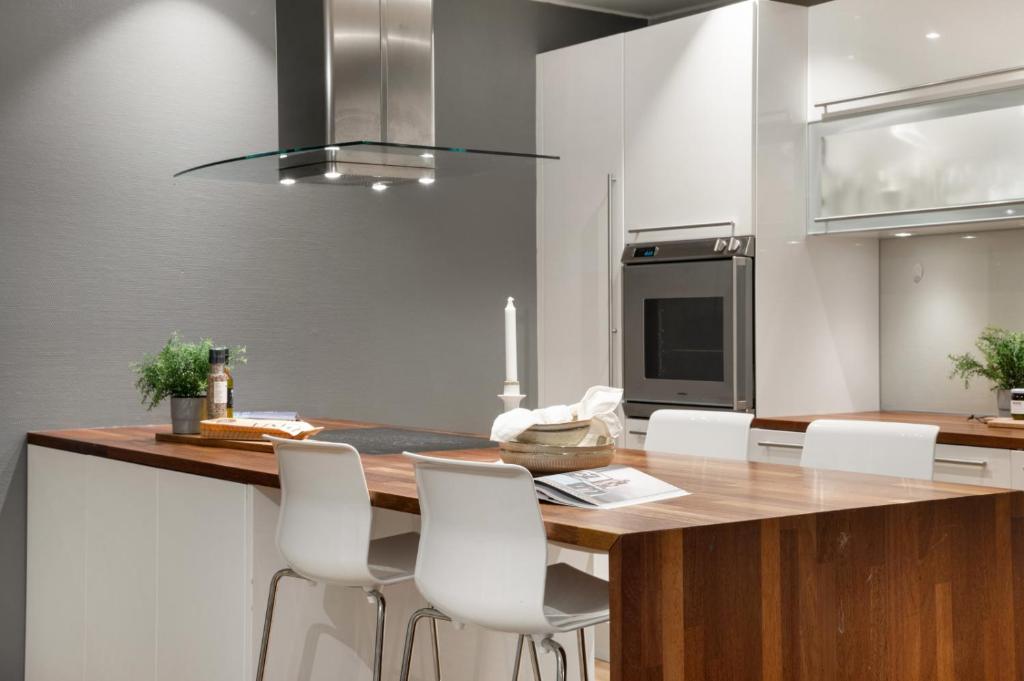 Kuchyň nebo kuchyňský kout v ubytování Fløyen Lux Apartment