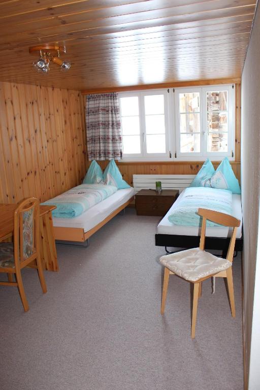 Een bed of bedden in een kamer bij Chalet Spinne