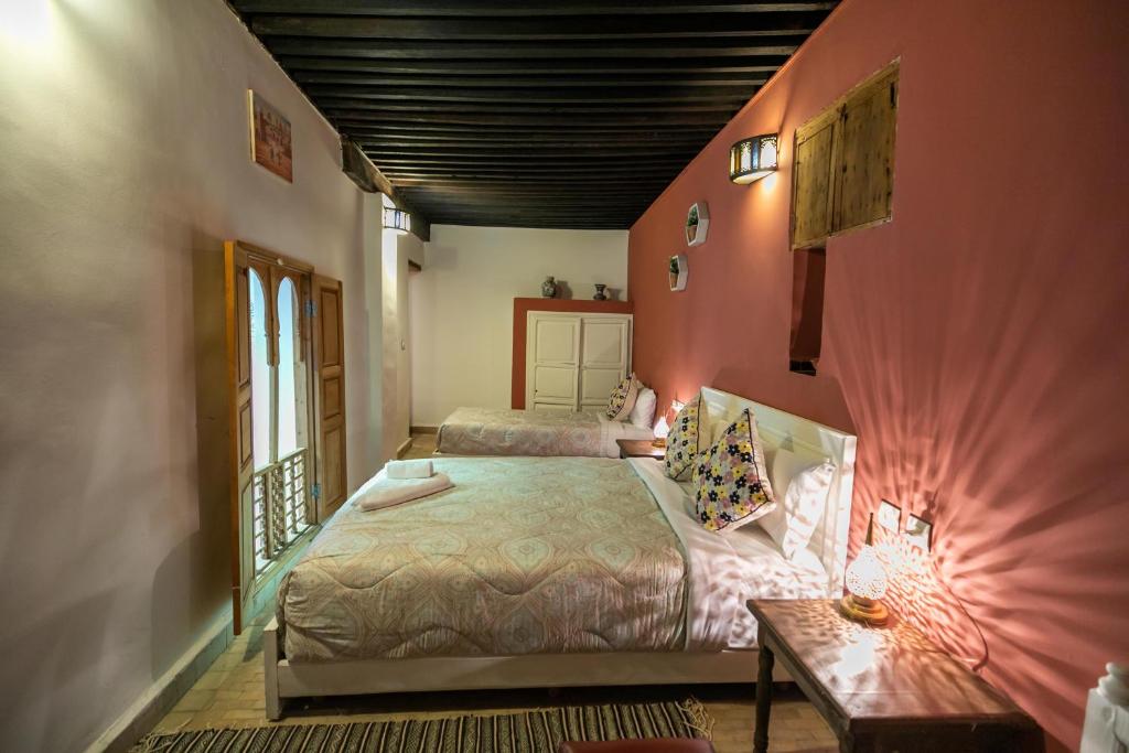 Postel nebo postele na pokoji v ubytování Riad Dar Hidaya Fes