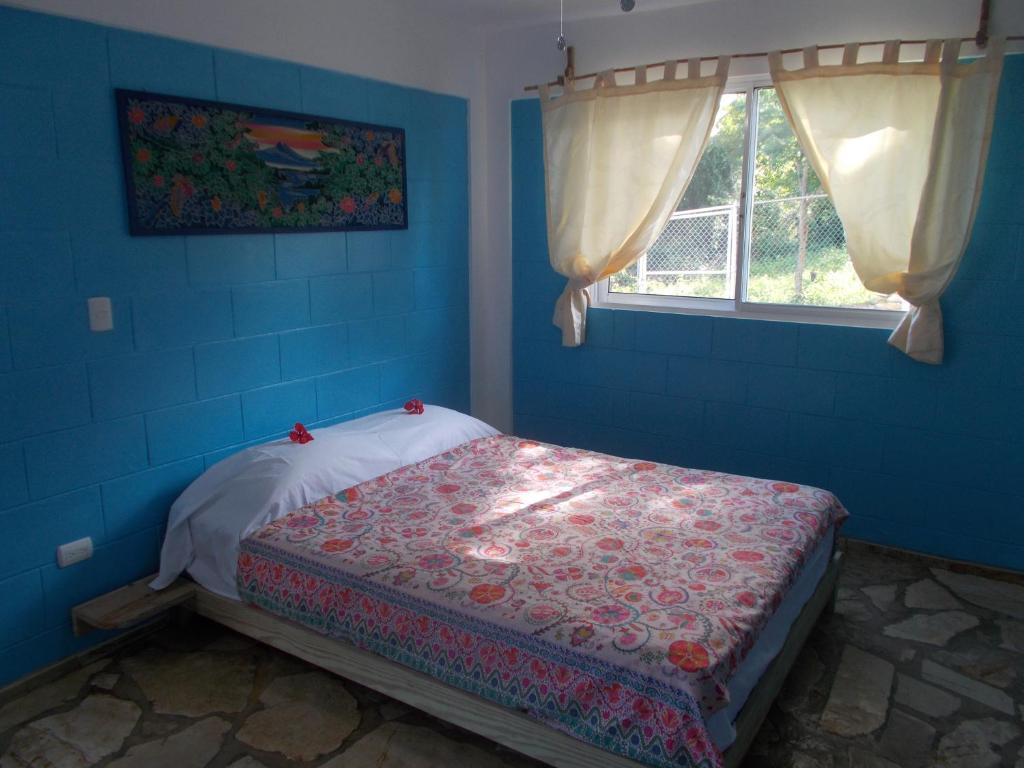 Postel nebo postele na pokoji v ubytování B&B El Mirador al Mar