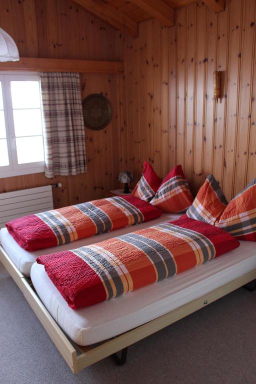 Een bed of bedden in een kamer bij Chalet Spinne