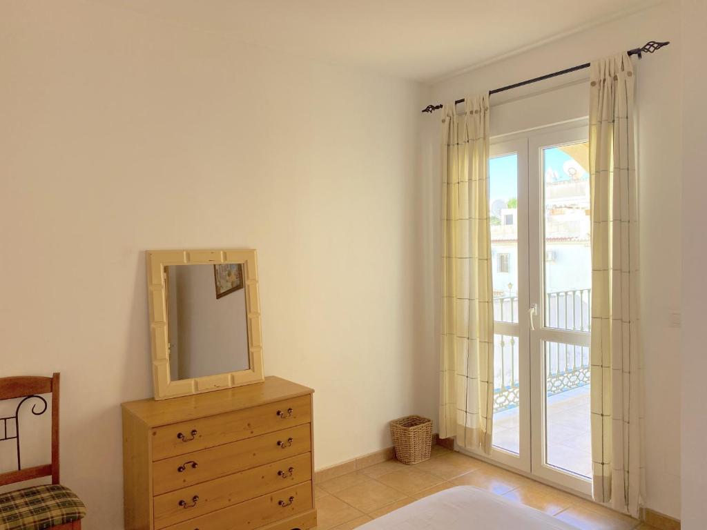 Postel nebo postele na pokoji v ubytování Milenio 1H Apartments Casasol
