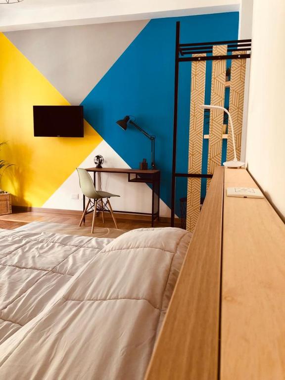 Posteľ alebo postele v izbe v ubytovaní Studio Falconara