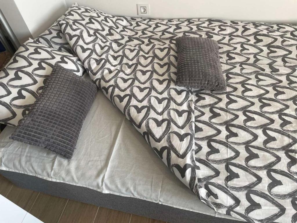 Una cama o camas en una habitación de Studio D&D