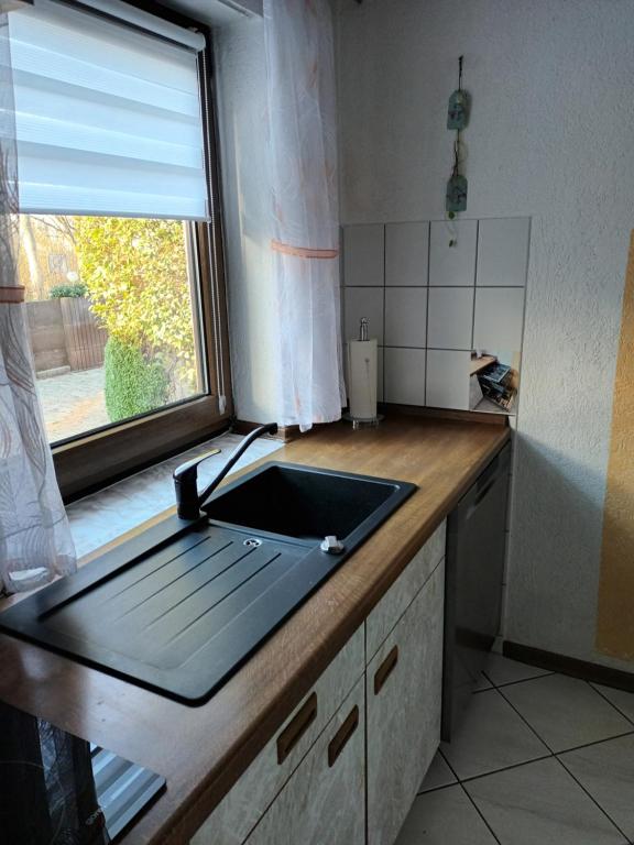Kuchyň nebo kuchyňský kout v ubytování Ferienwohnung Kiruga