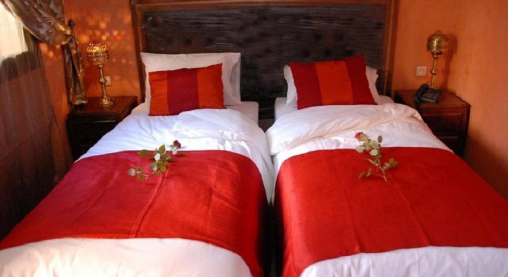 Postel nebo postele na pokoji v ubytování Marrakech House