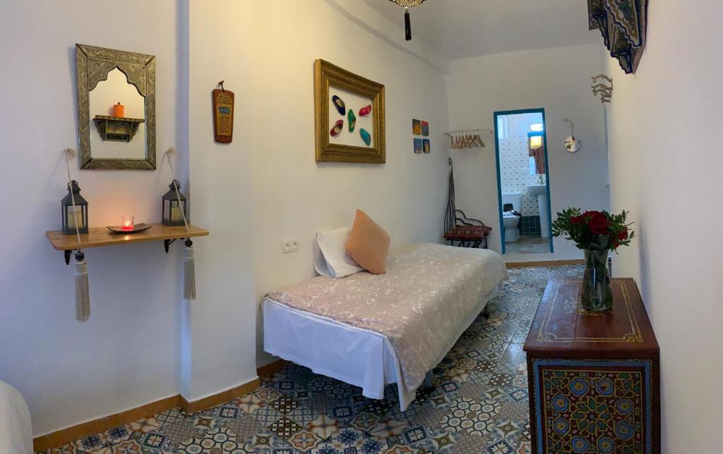Letto o letti in una camera di Riad Darna