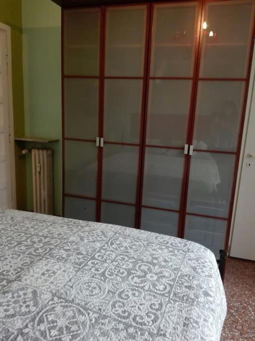 Łóżko lub łóżka w pokoju w obiekcie Liudan&rooms Affittacamere