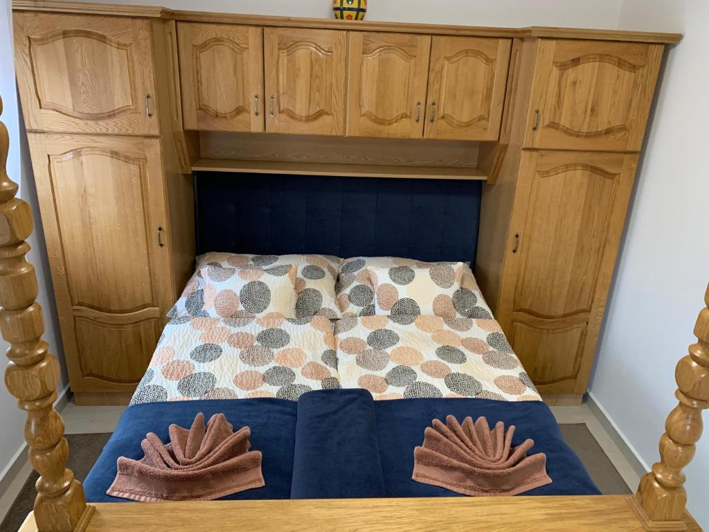 Posteľ alebo postele v izbe v ubytovaní Dodi Apartman