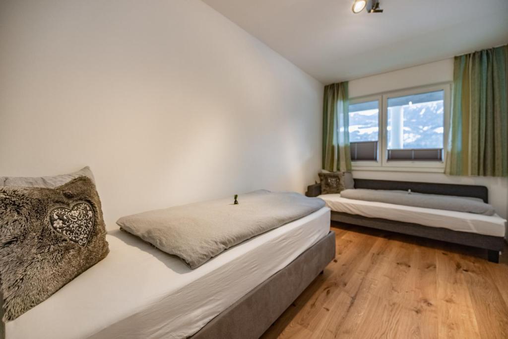 Posteľ alebo postele v izbe v ubytovaní Berg Apartment-Berg im Drautal
