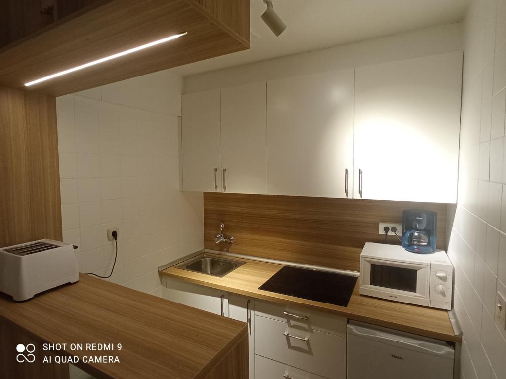 Kuchyň nebo kuchyňský kout v ubytování Precioso loft a 600m de la catedral