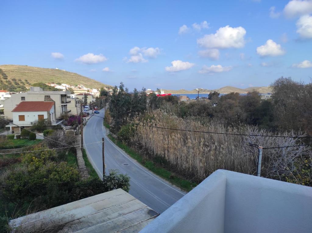 a view of a road from a balcony at Kea Island in Korissia