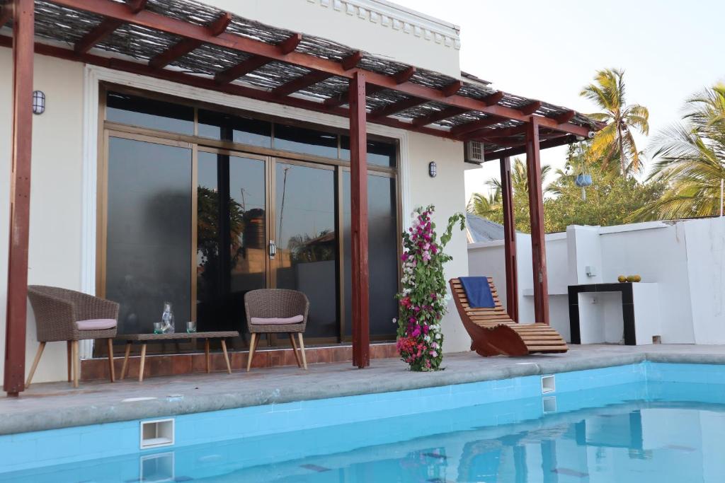 Swimmingpoolen hos eller tæt på Jambo Jambiani Beach Villa, Beautiful private villa at 2 minutes from the Beach