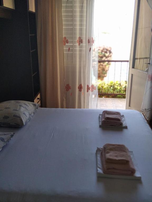 Postel nebo postele na pokoji v ubytování Apartment Marjana