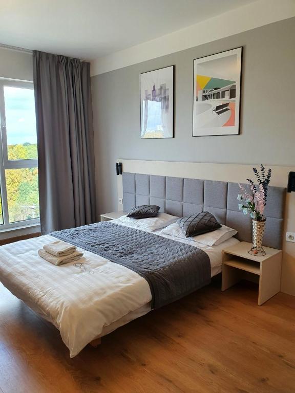 Posteľ alebo postele v izbe v ubytovaní Warsaw Apartments - Luxury Top-view Aparthotel