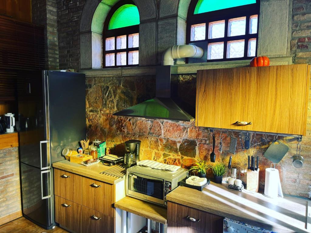 A kitchen or kitchenette at Lykos Mansion