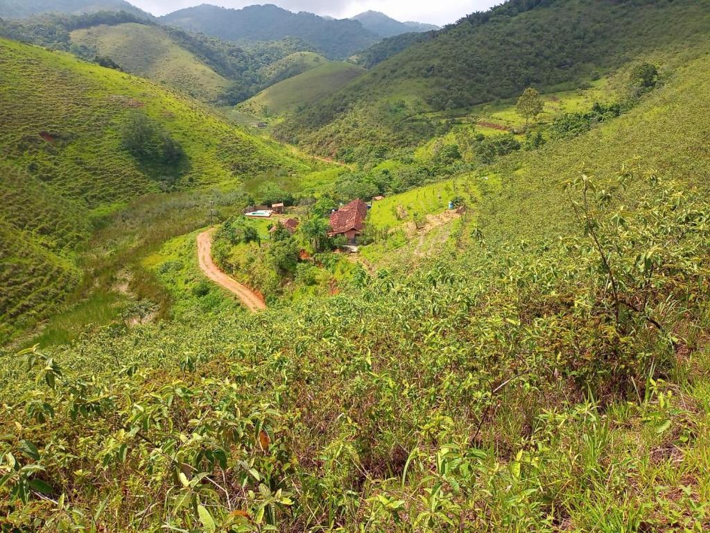 a view of a mountain with a road on a hill at Fazenda Águas Claras in Mendes