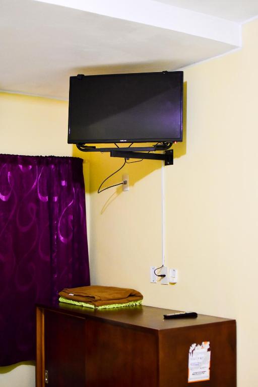 TV a/nebo společenská místnost v ubytování Palmas Park Hotel y Restaurant