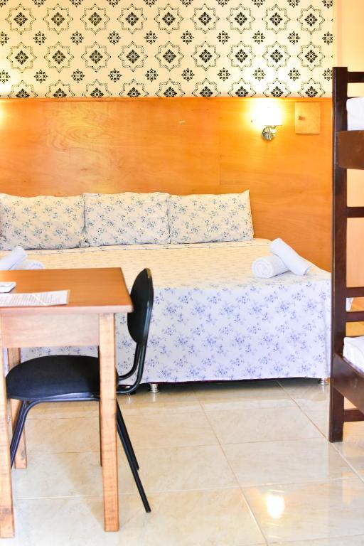 Postel nebo postele na pokoji v ubytování Palmas Park Hotel y Restaurant