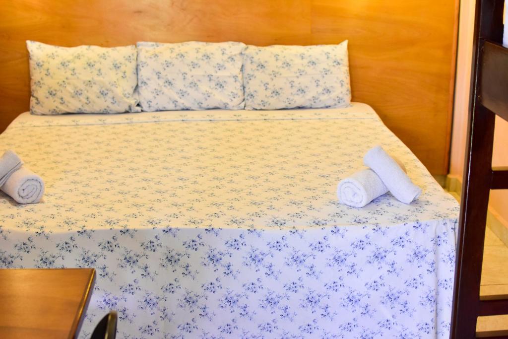 Postel nebo postele na pokoji v ubytování Palmas Park Hotel y Restaurant
