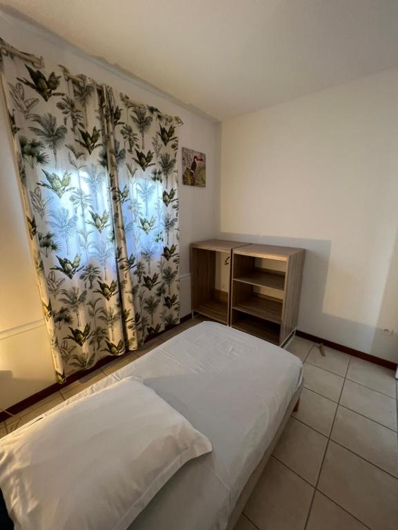 Postel nebo postele na pokoji v ubytování Villa Bambou