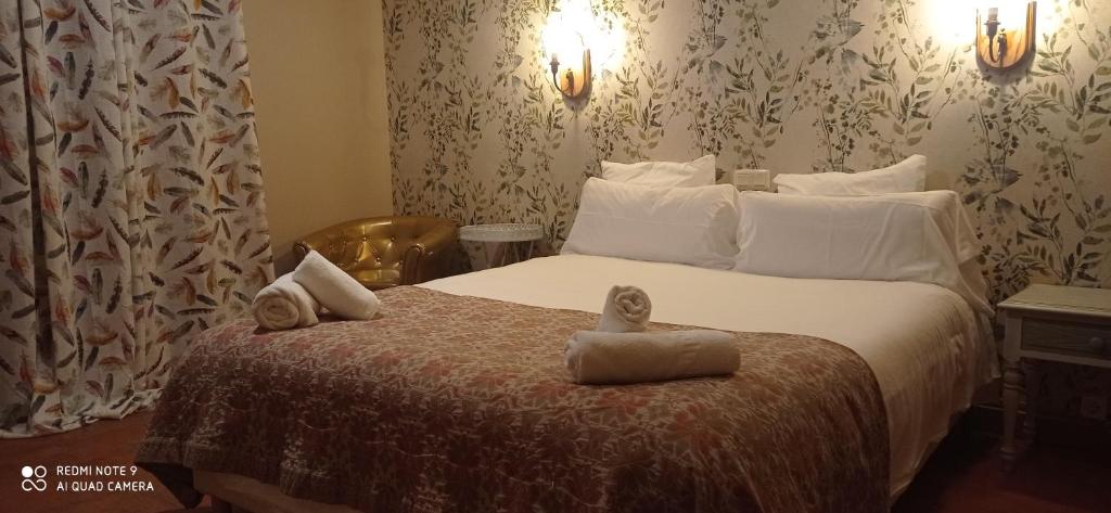 Postel nebo postele na pokoji v ubytování Hotel Río Escabas, Serranía de Cuenca