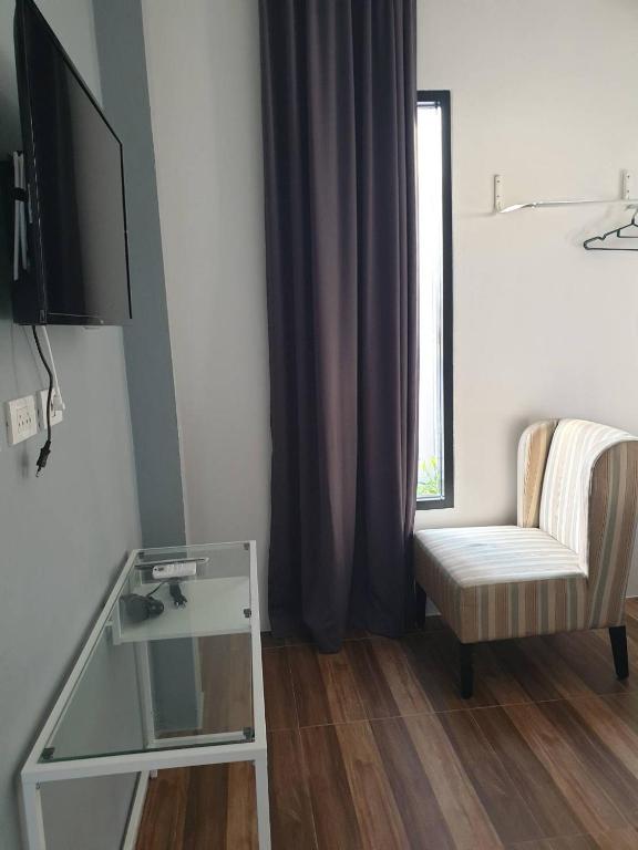 TV a/nebo společenská místnost v ubytování No 9 HOUSE Hua Hin