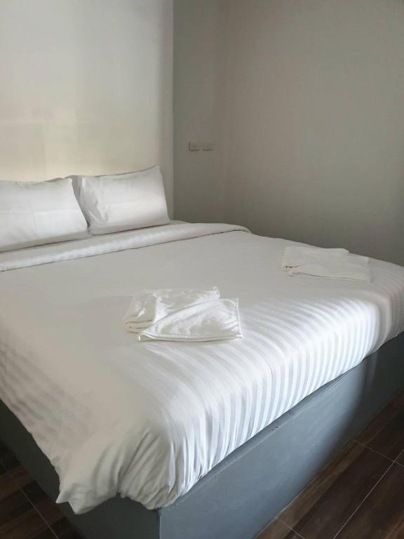 Postel nebo postele na pokoji v ubytování No 9 HOUSE Hua Hin